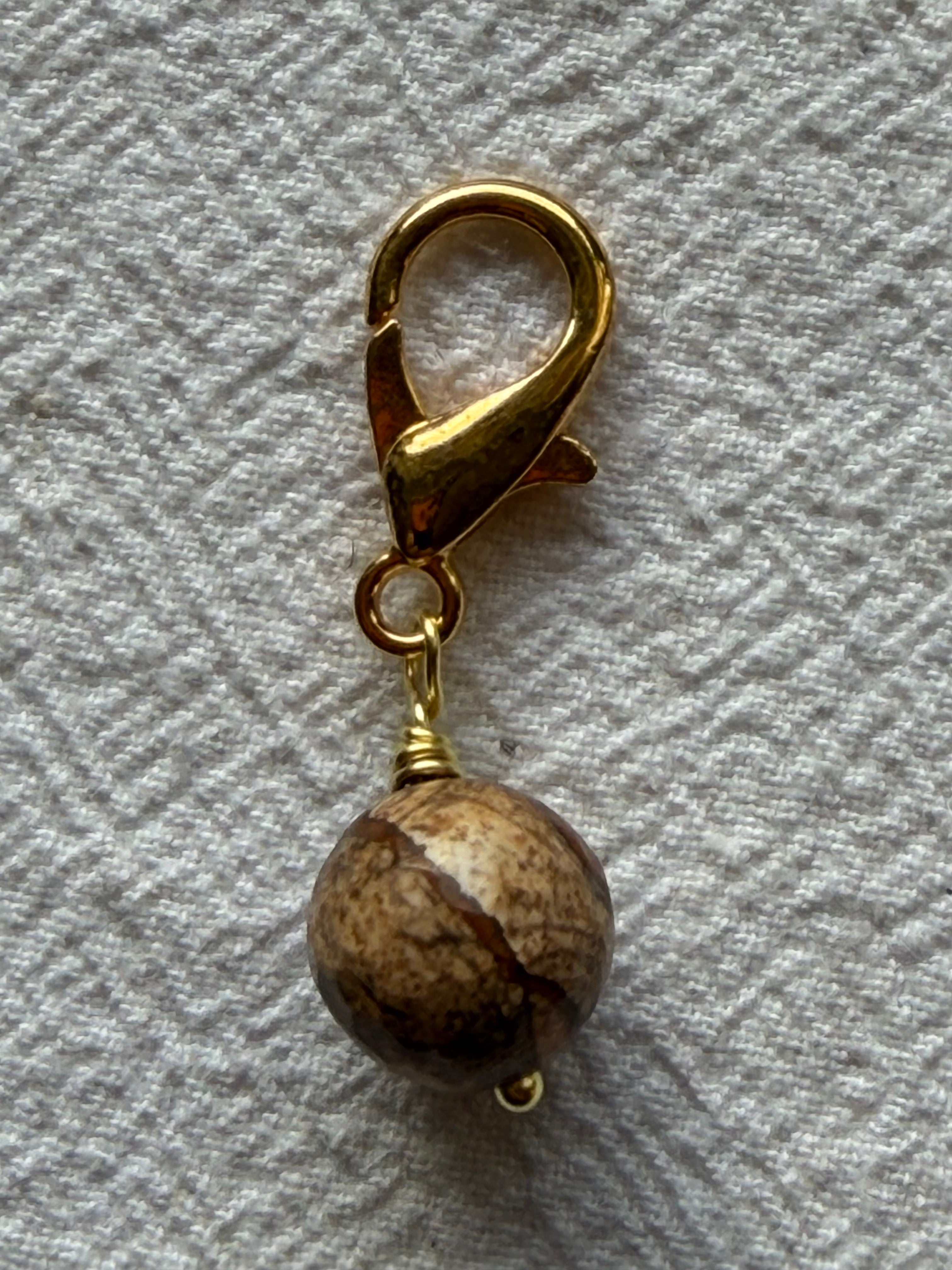 Raglan Markør sæt 4 forsølvet/forgyldt - Med 9 markører - de 8 som på billedet, den 9. Vælger du selv - Du vælger ringestørrelse - Du vælger med holder 229.- / uden holder 199.-