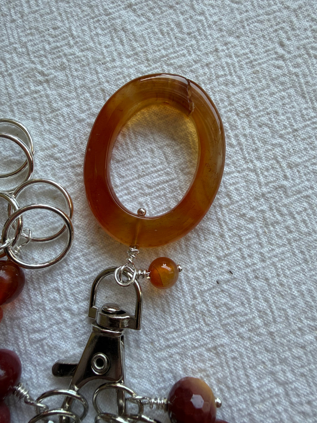Maskemarkør sæt Carneol stor oval markørholder. Markører i Carneol og Mookite. Forsølvet luksus med 11x7mm, 5x10mm og 5 åbenlukkelige markører