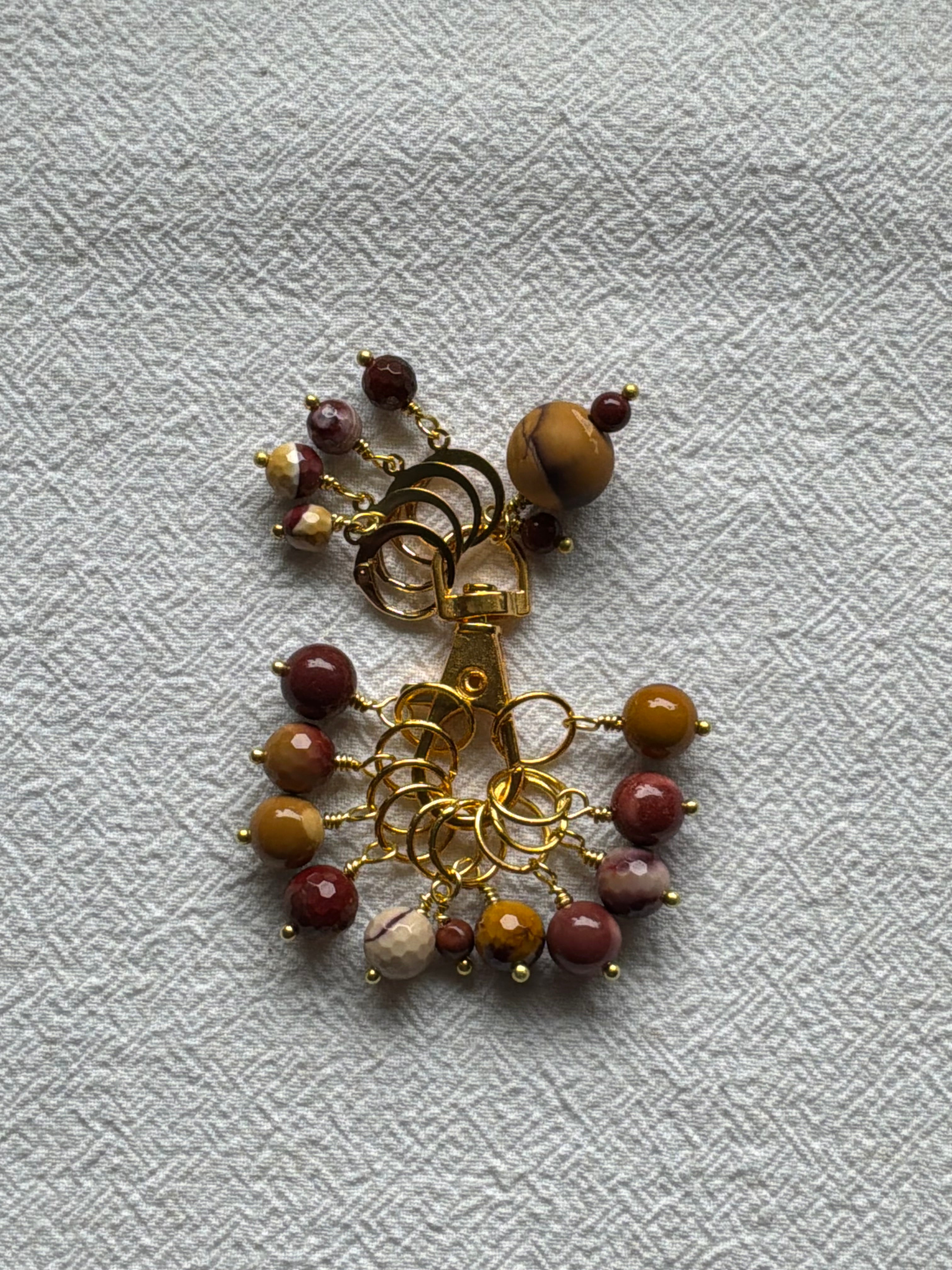 Maskemarkør sæt Mookite. Forgyldte markører der passer på op til 7 mm og åbenlukkelige