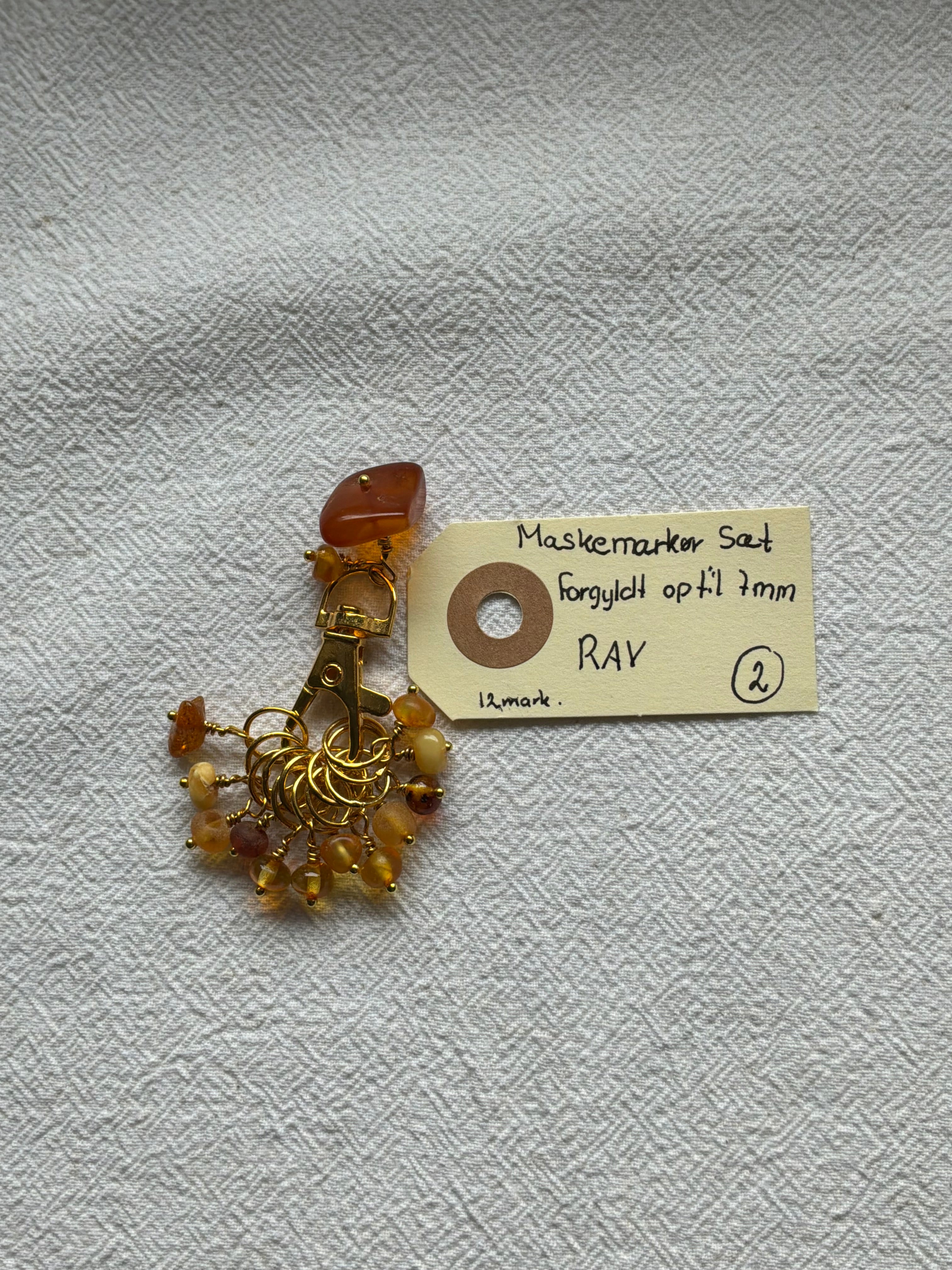 Maskemarkør sæt Rav Nordens guld. 2. Forgyldt med op til 7 mm markører og en markørholder