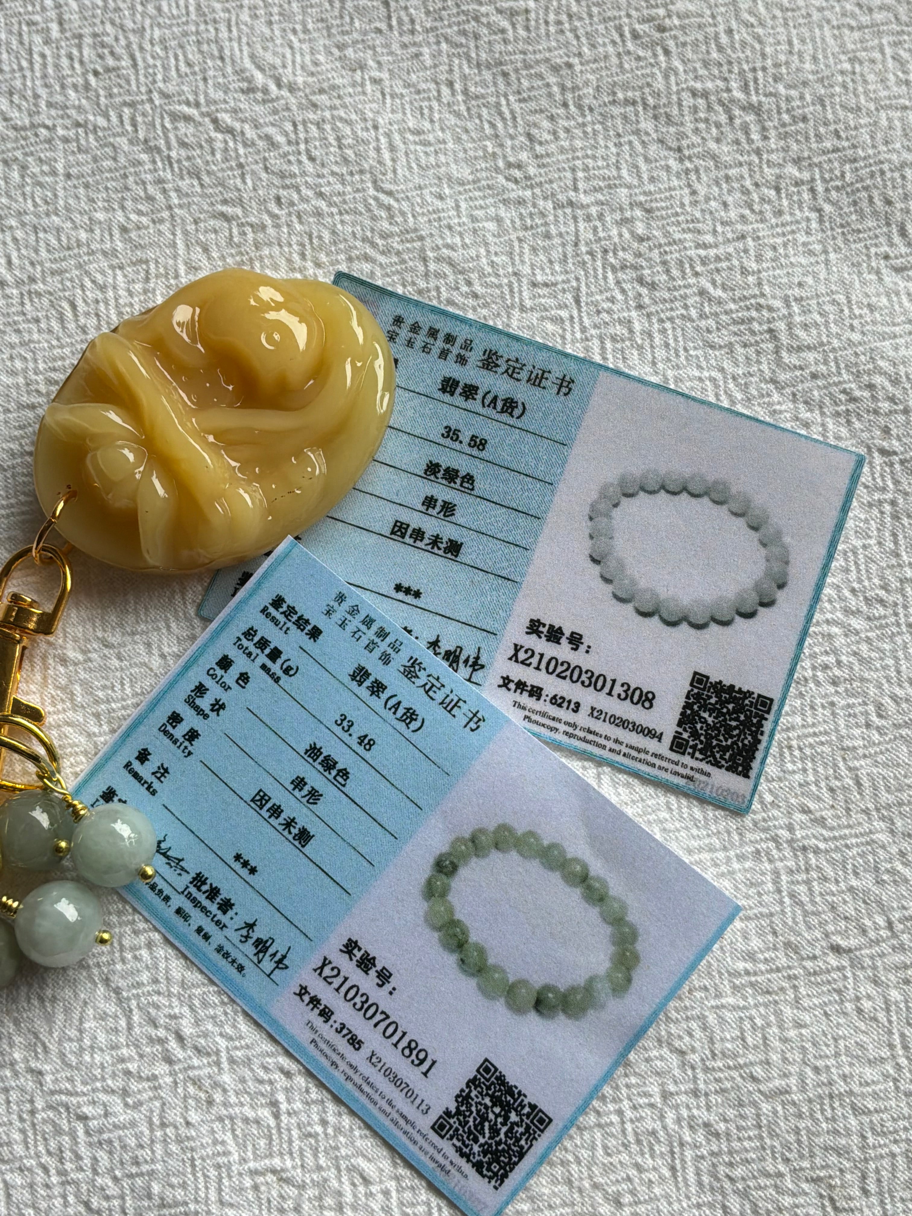 Maskemarkør sæt Jade grøn og gul. Markørholderen med et stort Lotus vedhæng. Forgyldt op til 10 mm