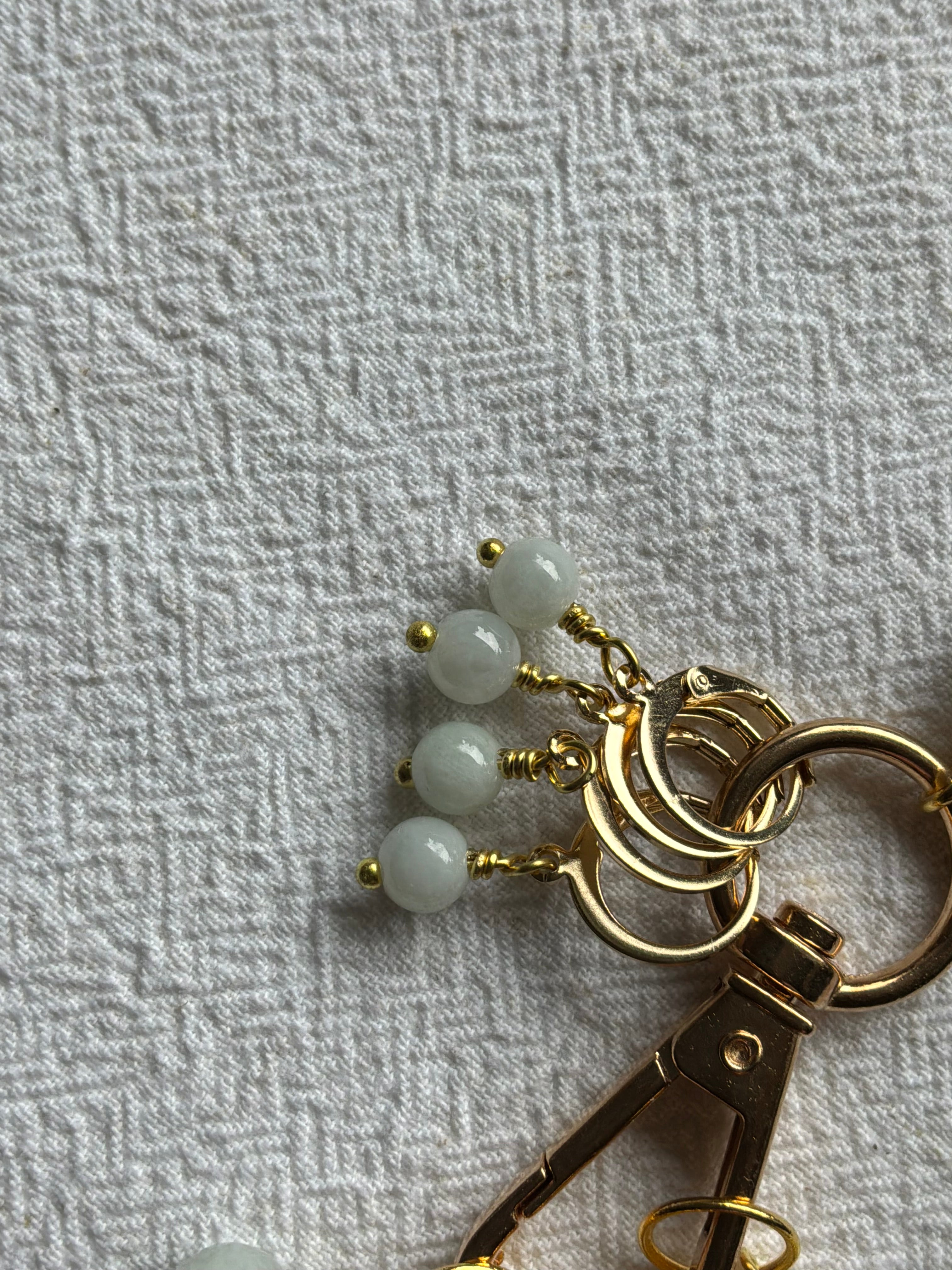 Maskemarkør sæt Jade grøn og gul. Med smiling Buddah vedhæng på markørholderen. Forgyldt op til 7 mm og åbenlukkelige