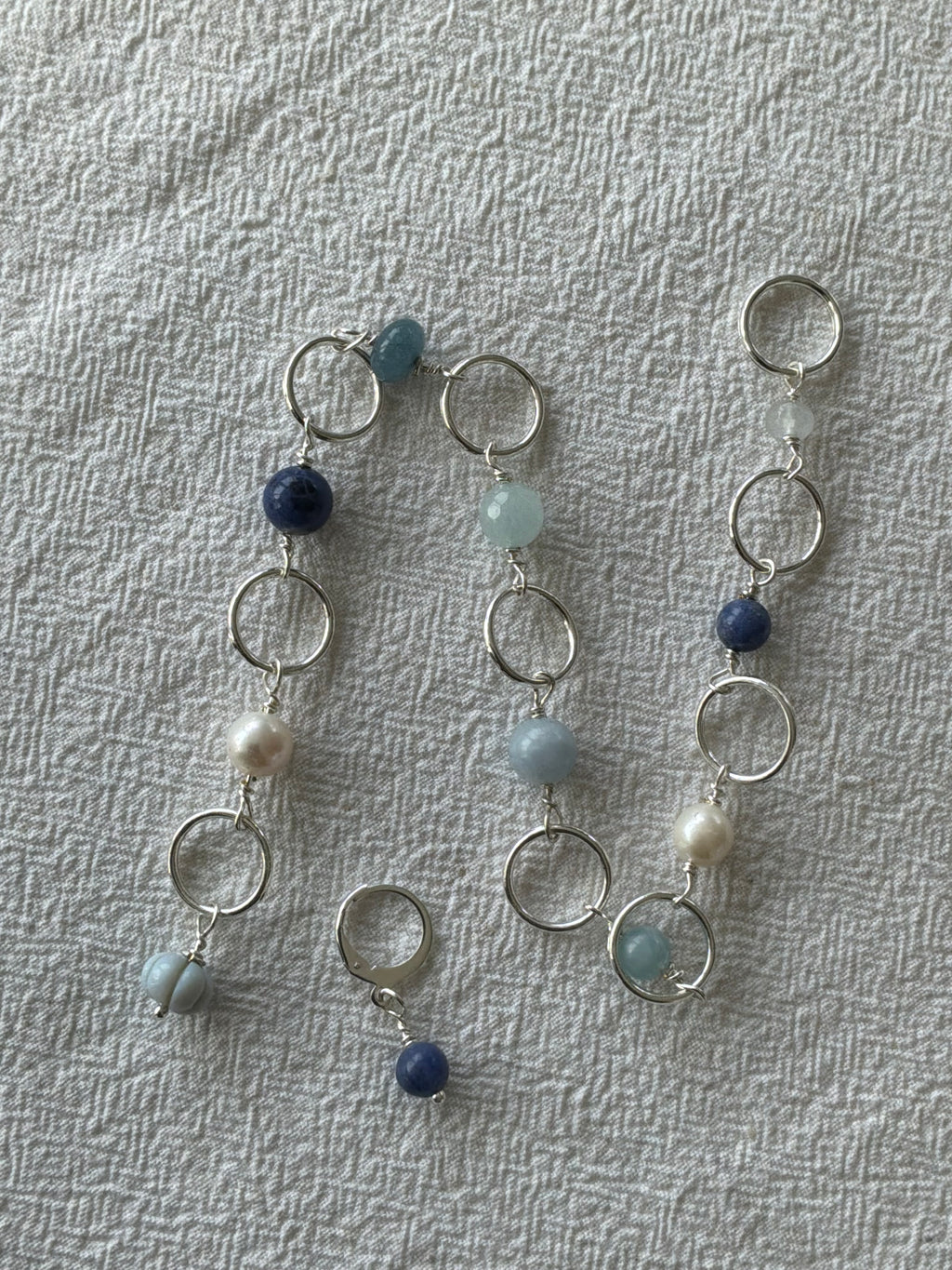 Strikkefisk forsølvet 10 ringe passer på op til 10mm. Akvamarin, Perle og Blue Oregon Opal