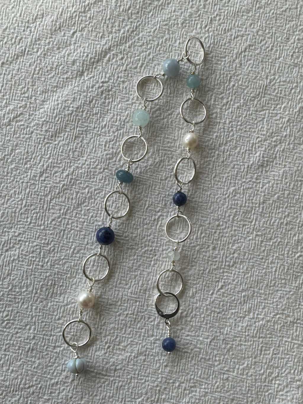 Strikkefisk forsølvet 10 ringe passer på op til 10mm. Akvamarin, Perle og Blue Oregon Opal